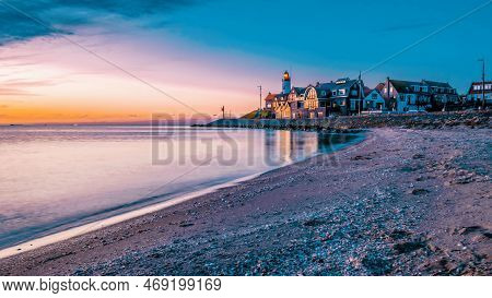 Urk Flevoland Netherlands Sunset At The Lighthouse And Harbor Of Urk Holland. Fishing Village Urk
