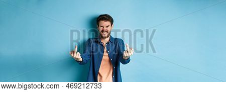 Angry Caucasian Man Say Fuck You And Showing Middle Fingers, Make Rude Gesture With Pissed-off Face,