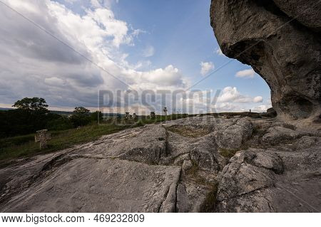 Pidkamin Inselberg Stone On Hill And Ancient Graveyard. Ukraine.