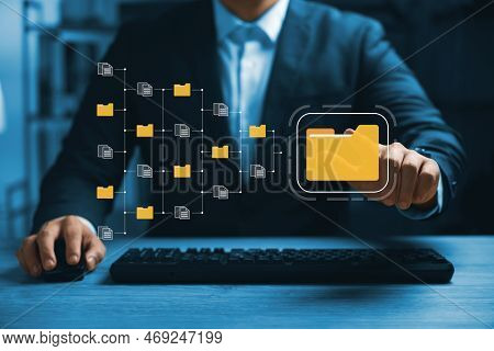 Document Management System Concept, Business Man Holding Folder And Document Icon Software, Searchin