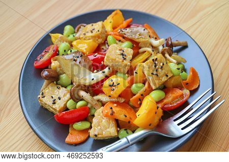 Plate Of Colorful Vegetable Salad With Velvet Pioppini Mushroom And Roasted Tempeh Cubes