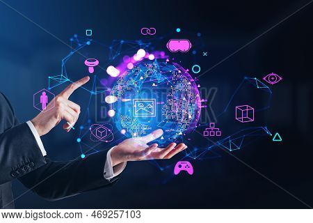 Businessman Finger Touch And Holding An Earth Sphere Hologram. Glowing Virtual Reality Icons, Nft An