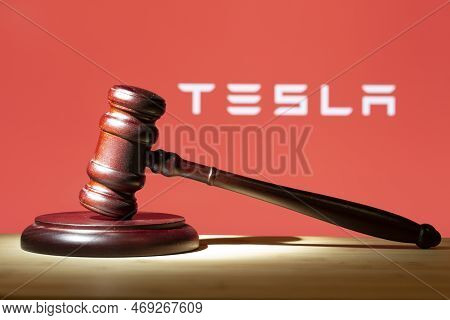 Syktyvkar, Komi, Russia, January 21, 2023,tesla,concept. A Court Hammer On The Background Of The Tes