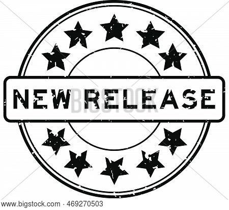 Grunge Black New Release Word With Star Icon Round Rubber Seal Stamp On White Background