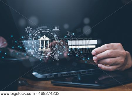 A Man Uses His Laptop Computer To Access Online Banking And Make A Payment. Mobile Banking Network, 
