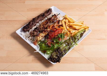 Pork Skewers With French Fries
