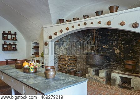 Manta, Itaky - October 14, 2018: The Kitchen With The Large Fireplace Of The Sixteenth-century Palac