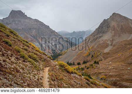 A Late Summer View Of A Hiking Trail Through The Beautiful Yankee Boy Basin Of Colorado Beneath Skie