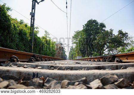 Picture Of A Rail Anchor On A Railway Track Of Indian Railways System.