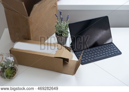 Shopping Online E-comerce, Parcel Boxes On A Laptop.
