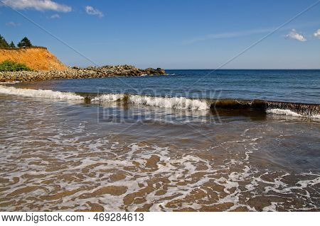Blue Sky And Waves At Kennington Beach, Cape Breton, Nova Scotia, Canada.