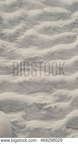 Beach Sand Texture, White, With Ripples, On A Sunny Day