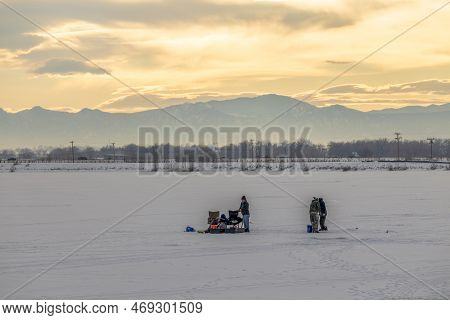 Longmont, Colorado - January 8, 2023: Ice Fishing On Blue Heron Reservoir In St. Vrain State Park, L