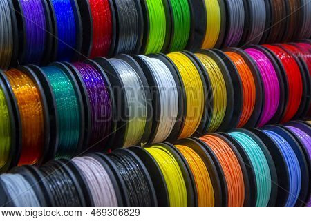 Many Multi-colored Spools Of Thread Of Filament For Printing 3d Printer. Material Coils For Printing