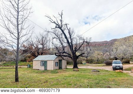 Kromrivier, South Africa - Sep 5, 2022: A Corrugated Iron Building And A Vehicle At Kromrivier Ceder