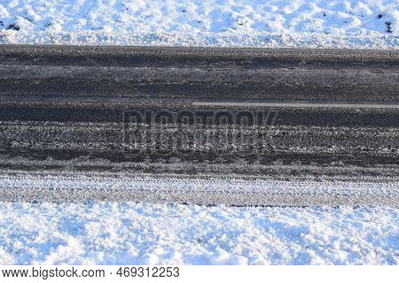 Country Road With A Bit Of Dirty Snow