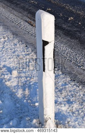 Roadside Reflector Covered With Fresh Wet Snow
