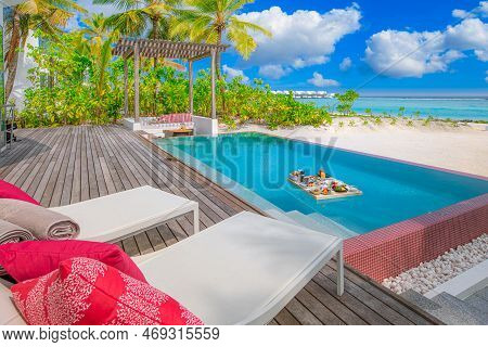 Breakfast In Swimming Pool, Floating Breakfast In Luxurious Tropical Resort. Table Relaxing On Calm 