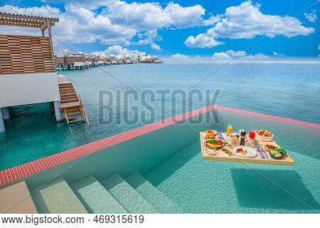 Breakfast In Swimming Pool, Floating Breakfast In Luxurious Tropical Resort. Table Relaxing On Calm 