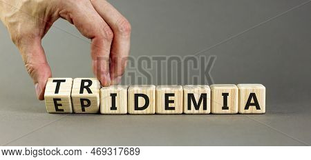 Covid-19 Epidemic Or Tridemic Symbol. Concept Word Epidemic And Tridemic On Wooden Cubes. Doctor Han