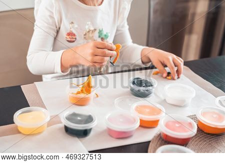 Little Girls Sculpt Figurines Crafts From Air Plasticine, Modeling Dough.online Lessons In Tablet. C
