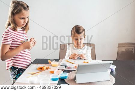 Little Girls Sculpt Figurines Crafts From Air Plasticine, Modeling Dough.online Lessons In Tablet. C