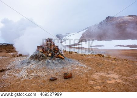 Geothermal Area In Iceland, Pure Green Energy At Sulfur Valley With Smoking Fumaroles. Famous Touris