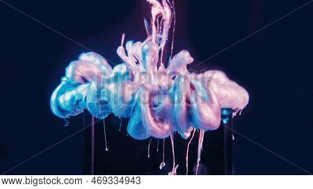 Ink Drop. Neon Fluid. Paint Water. Fantasy Cloud. Pink Blue Iridescent Color Glowing Liquid Splash O