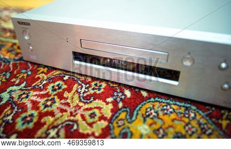 Paris, France - Oct 18, 2023: Living Room Carpet Silk Rug With Onkyo Bd-sp809 Top-of-the-range Blu-r