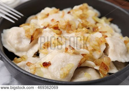 Cooked Dumplings (varenyky) With Tasty Filling And Fried Onions In Frying Pan, Closeup