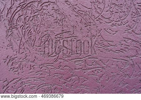 Macro Of Dusty Purple Wall With Stucco Worm Finish