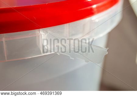 Close-up Of Empty Round Plastic Conteiner With Lid. Opened Conteiner