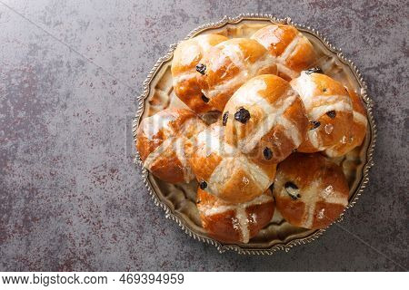 Hot Cross Buns Are A Traditional English Easter Pastry Close-up In A Plate On The Table. Horizontal 
