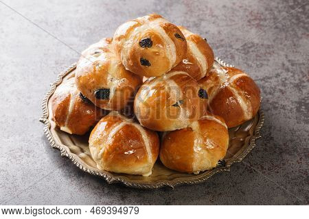 Hot Cross Buns Are A Traditional English Easter Pastry Close-up In A Plate On The Table. Horizontal