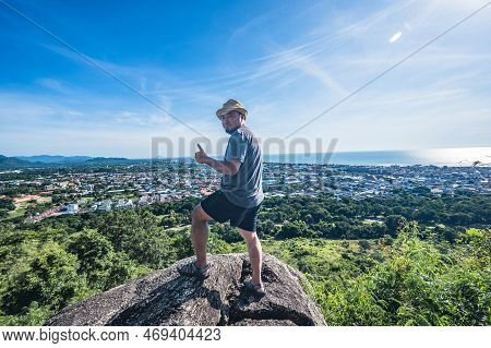 Asian Fat Man Stand On The Rock  At Khao Hin Lek Fai View Point.khao Hin Lek Fai Is A Place To See A