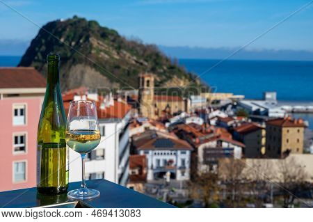 Tasting Of Txakoli Or Chacolí Slightly Sparkling Very Dry White Wine Produced In Spanish Basque Coun