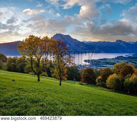 Peaceful Autumn Alps Mountain Lake With Clear Transparent Water And Reflections. Sunrise View To Tra