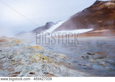 Geothermal Area In Iceland. Smoking Fumaroles. Real Volcanic Activity. Evaporating Water. Hverir