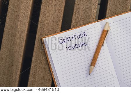 Writing Gratitude Journal On Wooden Bench. Today I Am Grateful For. Self Discovery Journal, Self Ref