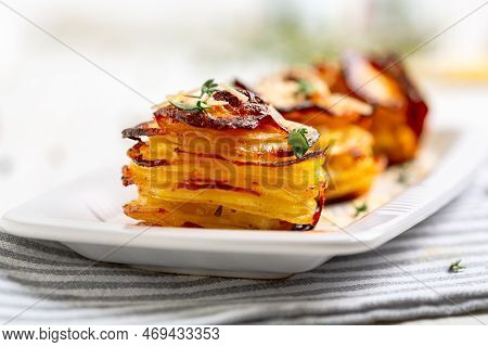 Baked Thin Slices Of Potatoes With Melted Butter, Garlic, Parmesan And Thyme.parmesan Potatoes Stack