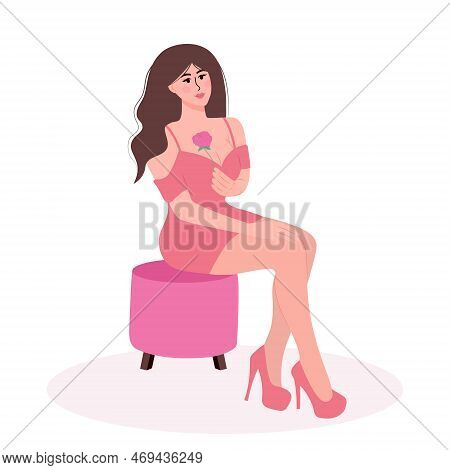 Young Pretty Woman Sitting On A Pouffe And Holding A Rose. Fashion, Makeup, Beauty Care, Female Beau