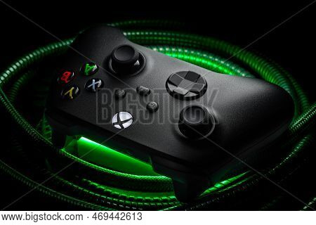 January 15, 2023, Odessa, Ukraine. A Black Xbox Wireless Controller Highlighted In Green And Red. Co