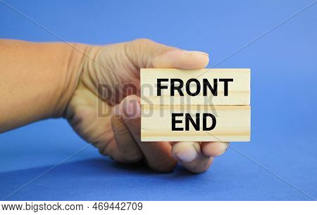 Hand Holding A Stick With The Words Front End. Inscription Frontend Software Development Concept