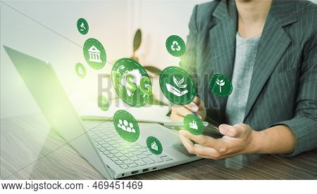 Esg Environment Social Governance Investment Business Concept. Women Use A Computer To Analyze Esg, 