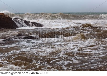 View Of The Volcanic Shore Of The Stormy Atlantic Ocean In The Area Of Essaouira In Morocco.