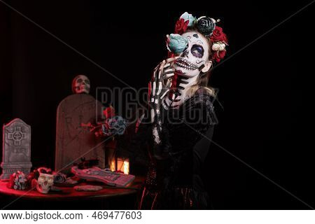 Santa Muerte Horror Lady Wearing Flowers Crown And Holding Beautiful Rose, Looking Glamour In Mexica