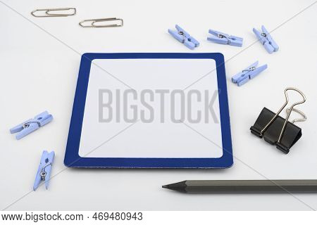 Important Messages. Sticker Lying On White Desk With Clotherspins. Crutial Informations Memos. White
