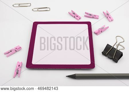 Important Messages. Sticker Lying On White Desk With Clotherspins. Crutial Informations Memos. White