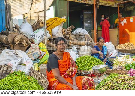 Puttaparthi, Andra Pradesh - India - January 21.2023: A Women Selling Vegetables On The Local Indian