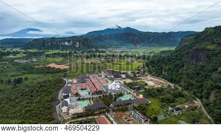 Aerial View Of White Mosque In A Beautiful Landscape View Of Harau Valley With Mountains Valley And